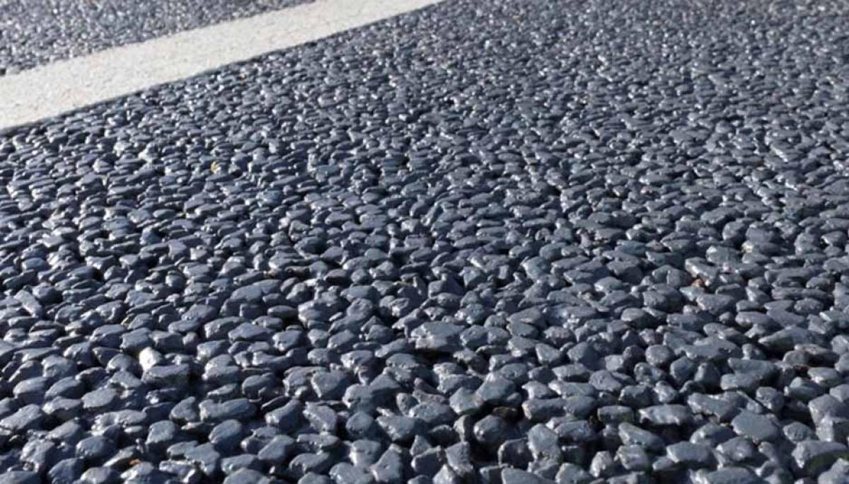 TopMix: l'asfalto super-drenante - Tarmac