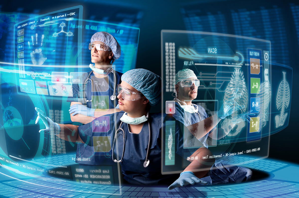 Meeting Italia/USA: un nuovo modello di formazione e ricerca per lo sviluppo della Sanità Digitale - Doctors in a research station with digital  screens and keyboard, PH:  ©Luis Louro Fotolia.com