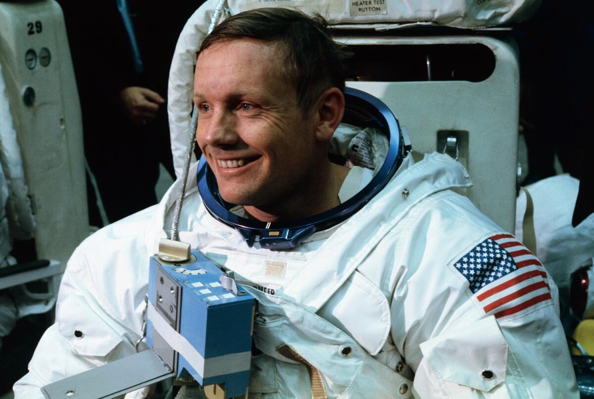 Quel piccolo grande passo.. - 18 Apr 1969, Houston, Texas, USA --- Space Center, Houston: Astronaut Neil A. Armstrong, in training for the projected Apollo 11 lunar landing mission, is being suited up for the first full dress rehearsal of activities he is to perform during the pr