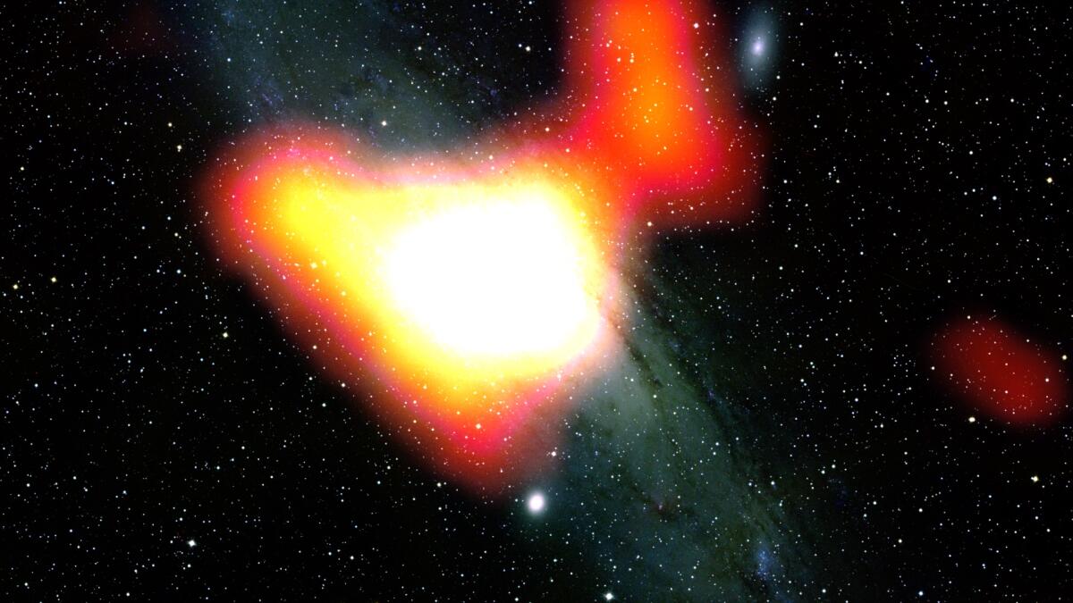 NASA, osservata l'impronta della materia oscura nella galassia di Andromeda - Rappresentazione artistica del lampo gamma generato dalla materia oscura nella galassia Andromeda.

Credits: NASA/DOE/Fermi LAT Collaboration; Bill Schoening, Vanessa Harvey/REU program/NOAO/AURA/NSF)