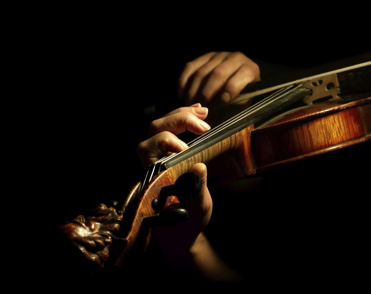 Patologie della mano sempre più frequenti tra i musicisti - Patologie mano Violino, crediti:
