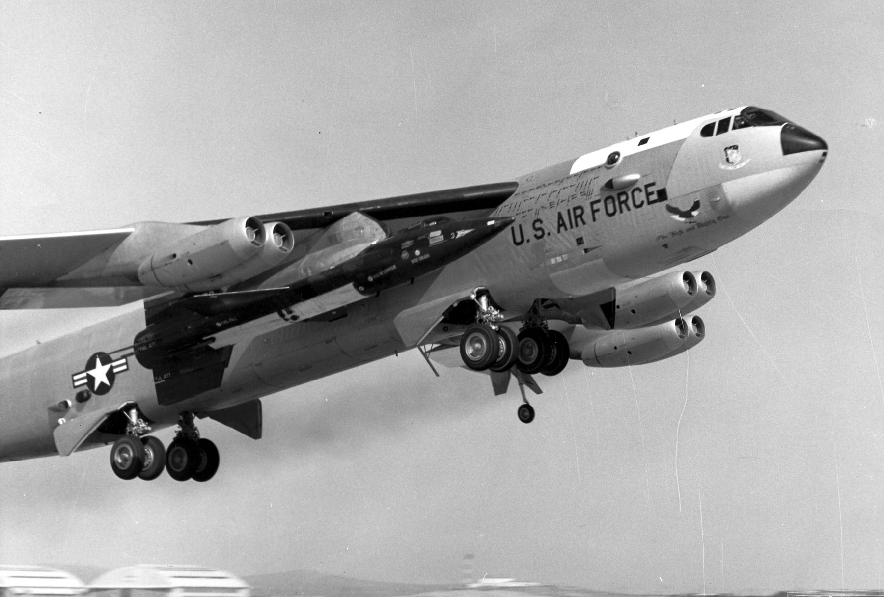 Boeing NB-52A take off with X-15 No. 3 (S/N 56-6672) on July 17, 1962, when Maj. White flew to an altitude of 314,750 feet. The NB-52A was named "The High and Mighty One" at this time. Note the X-15 mission markings on the fuselage just forward of the win