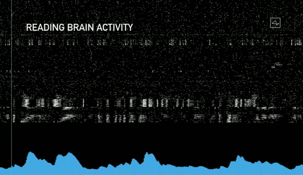 I punti bianchi rappresentano i picchi neurali mentre il segnale blu mostra un accumulo dei picchi neurali nella regione di impianto.