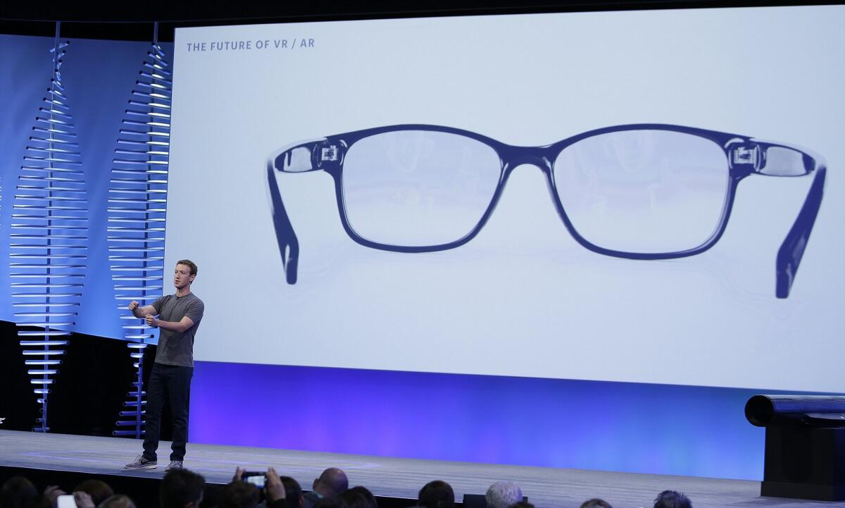 Facebook ed EssilorLuxottica: annunciati smart glasses Ray-Ban - Facebook CEO Mark Zuckerberg talks about augmented reality glasses during the keynote address at the F8 Facebook Developer Conference Tuesday, April 12, 2016, in San Francisco. Facebook says people who use its Messenger chat service will soon be able