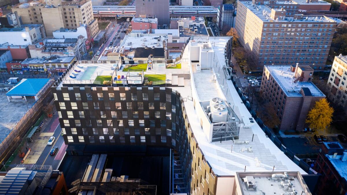 Smile a New York, edificio residenziale ispirato ad Harlem - Smile nella sua forma a sorriso. PH: buzzbuzzhome.com