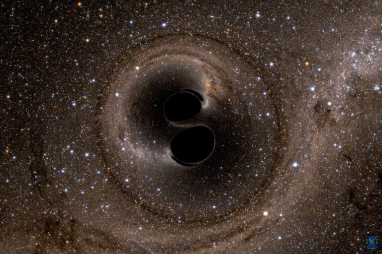 Simulazione al computer mostra la collisione tra due buchi neri che hanno prodotto il segnale dell’onda gravitazionale GW150914. Credits: Simulating eXtreme Spacetimes (SXS) project.