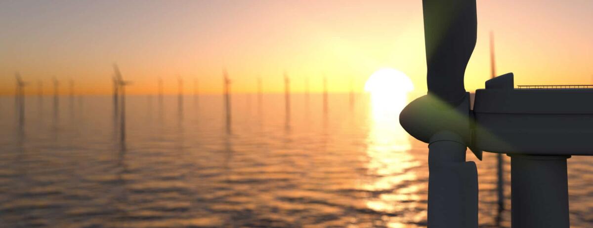 RecyclableBlade, quando la turbina eolica si fa "circolare" - Large off shore wind farm at sunset panoramic 3d render