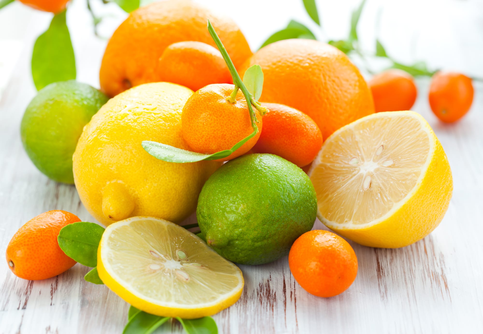 Citrus fresh fruit on the white wooden table