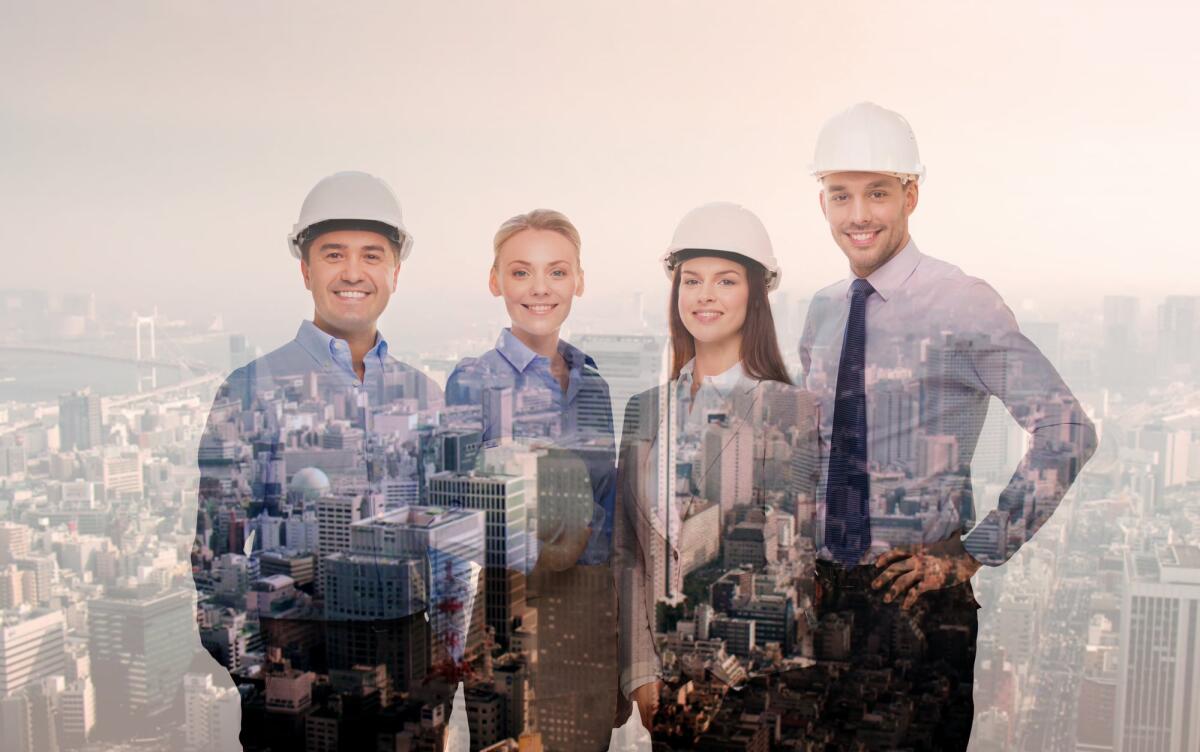 Congresso Nazionale CNI, gli Ingegneri si preparano - business, architecture, development and people concept - happy team in white hardhats over transparent city background