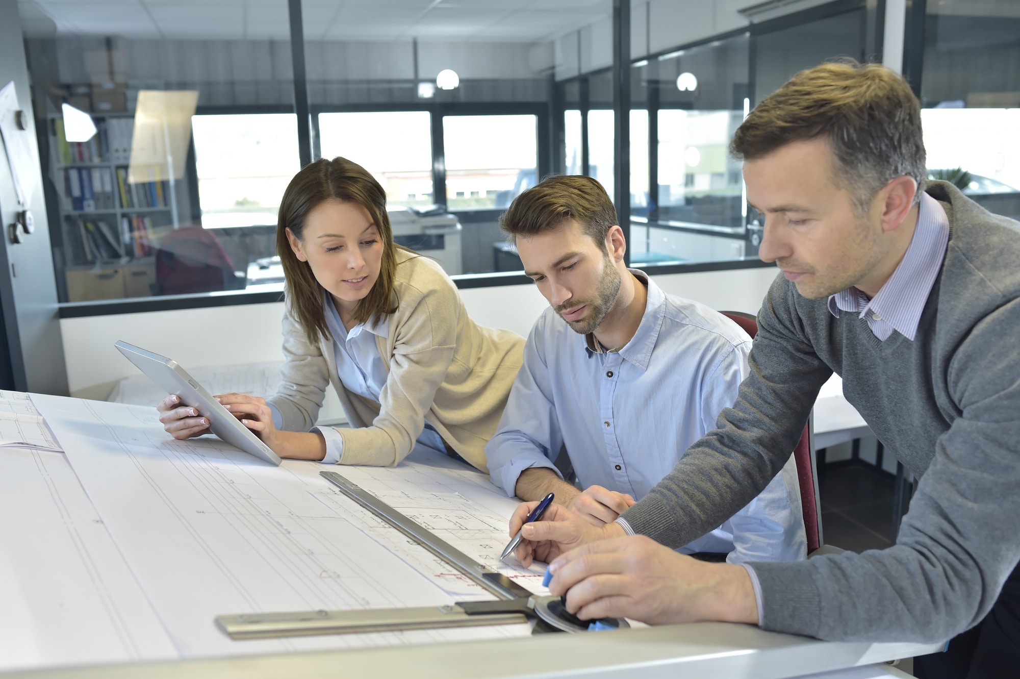 Team of architects working on construction project
