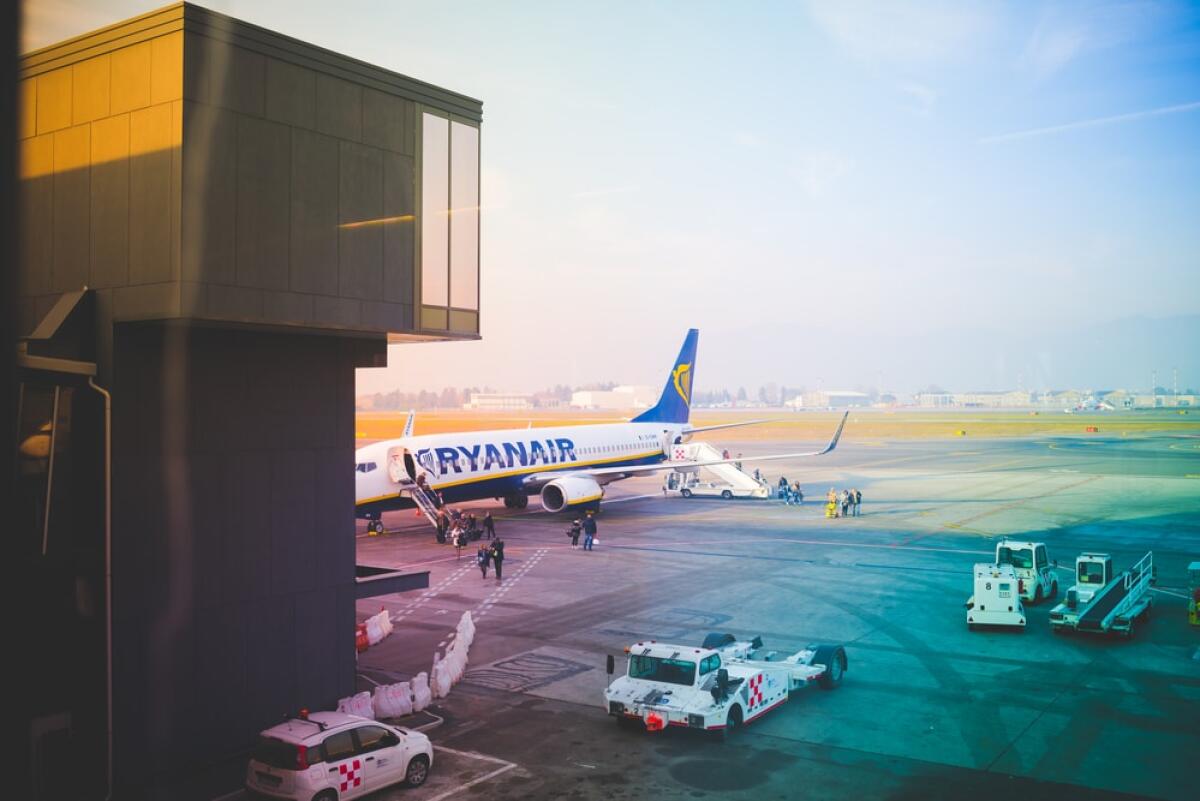 Ryanair taglia le rotte invernali per la Sardegna - SARDINIA, ITALY - JANUARY 2, 2016: View of a Ryanair Jet aircraft preparing for boarding. Ryanair is the biggest low-cost airline company in the world.