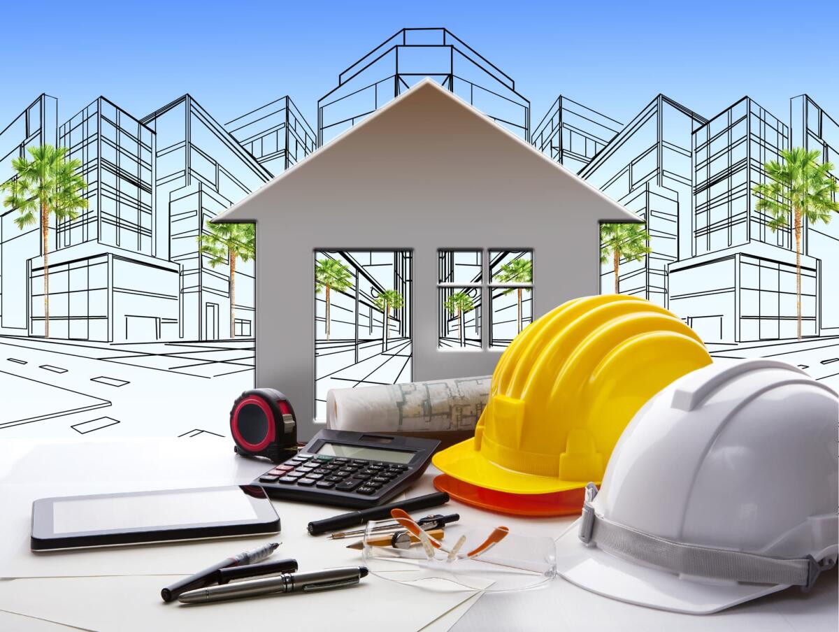 Servizi di ingegneria ed architettura, in forte calo nel 2023 - architect working table with construction industry and engineer working tool on top of table use for real estate and property land development theme