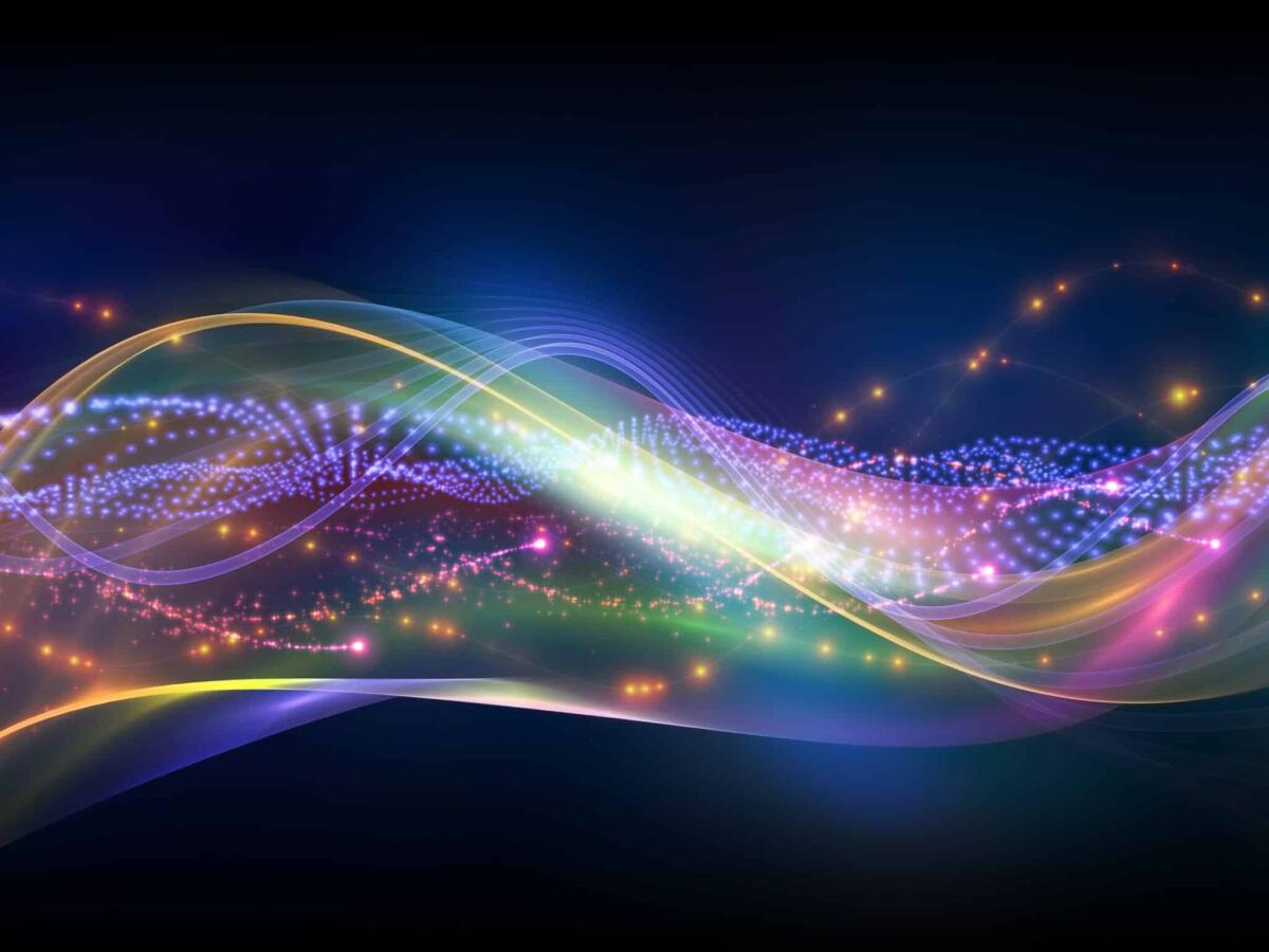 Uno studio scopre come è possibile controllare il comportamento caotico della luce - Interplay of overlapping abstract  waves, colors and lights  on the subject of technology, entertainment, communications, sound and audio