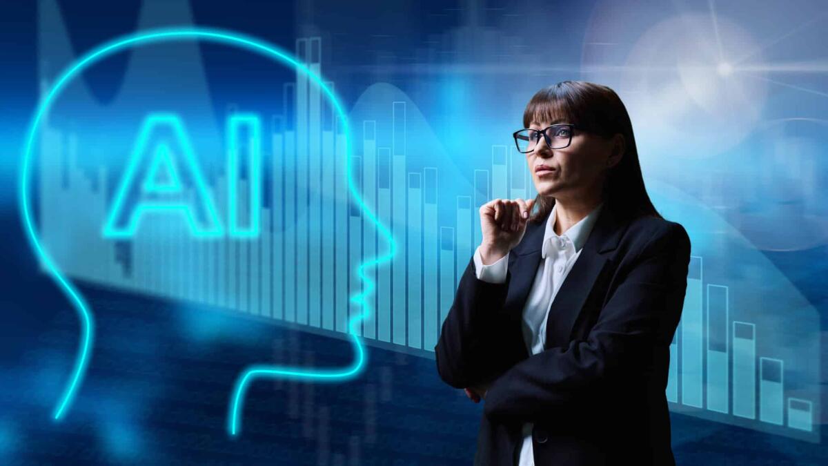 Intelligenza artificiale e lavoro: possibili scenari futuri - Business woman using artificial intelligence to manage work learning. Strategy, investment, statistical charts, virtual holograms, technology innovation business concept