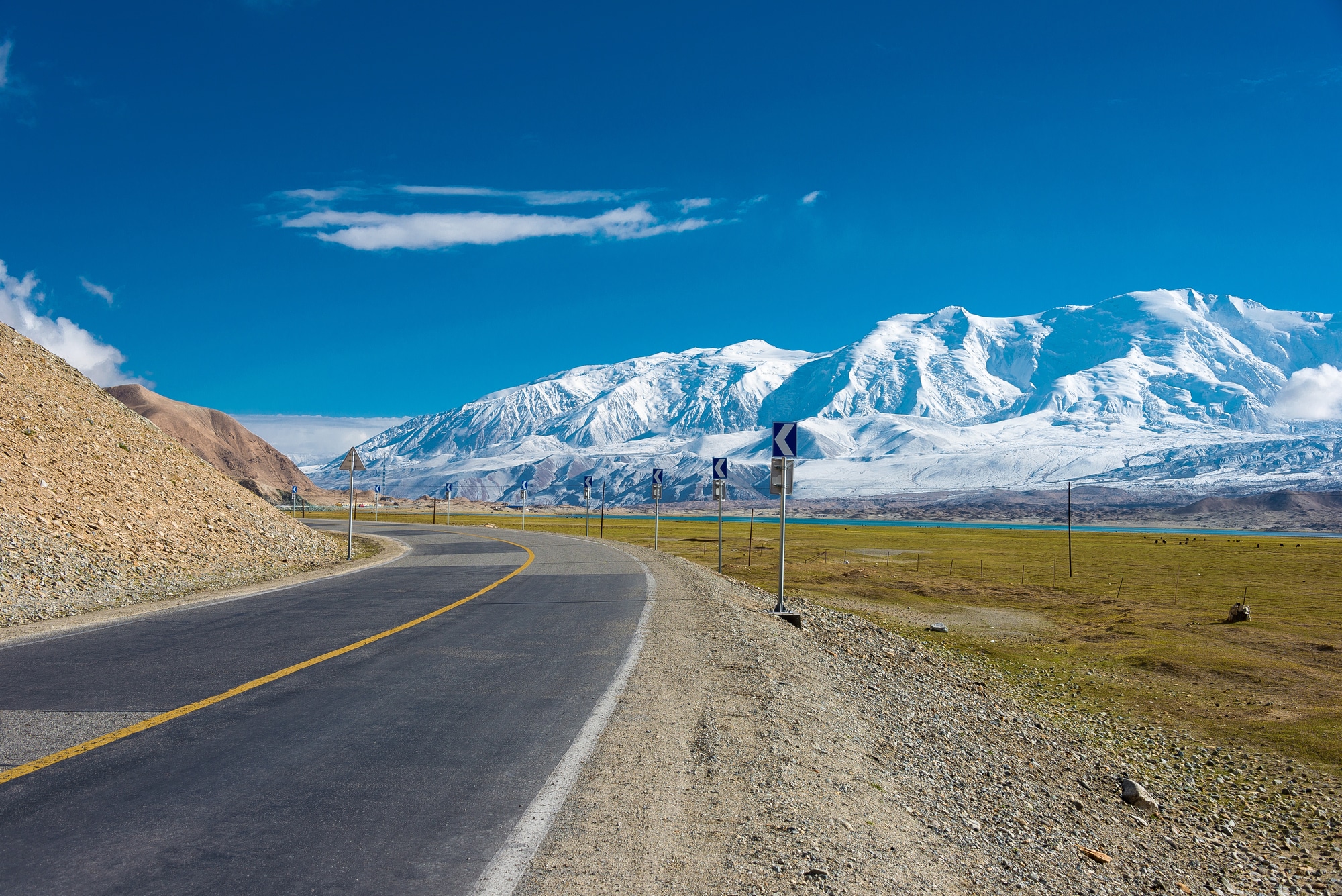 XINJIANG, CHINA - May 21 2015: Karakoram Highway. a famous landscape on the Karakoram Highway in Pamir Mountains, Akto County,Kizilsu Kirghiz Autonomous Prefecture, Xinjiang, China.