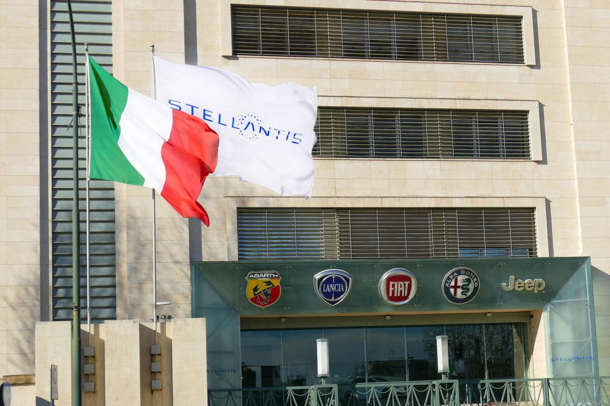 Giorgia Meloni non è d'accordo con le scelte strategiche di Stellantis - TURIN, ITALY - Jan 23, 2021: New Stellantis automotive corporation logo appear on plate and flags at italian headquarters Turin Italy January 23 2021