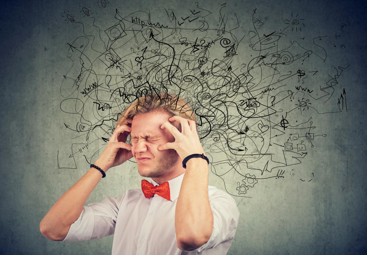 Paure irrazionali: siamo più vicini a capire come vengono generate dal nostro cervello - Stressed young man with a mess and confusion in his head