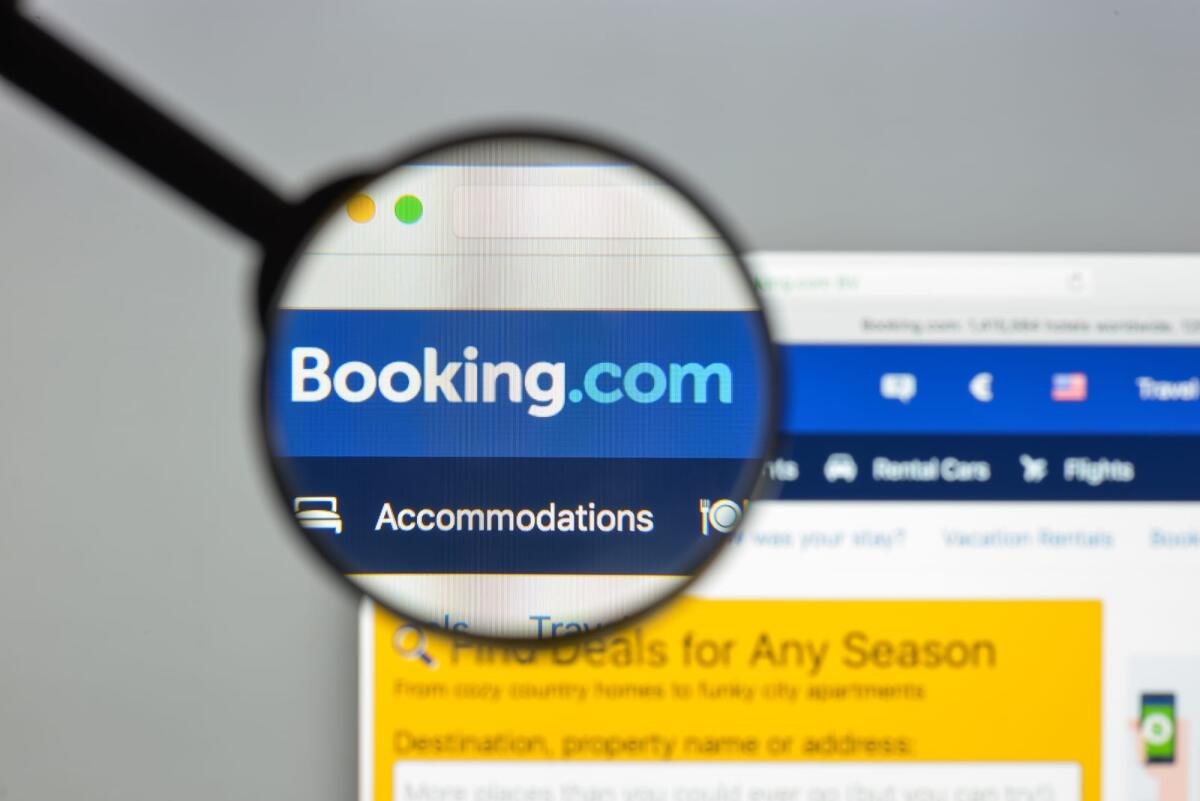 Booking sotto la lente dell'Antitrust: indagine per presunto abuso di posizione dominante - Milan, Italy - August 10, 2017: Booking.com website homepage. It  is a travel fare aggregator website and travel metasearch engine for lodging reservations. Booking logo visible.