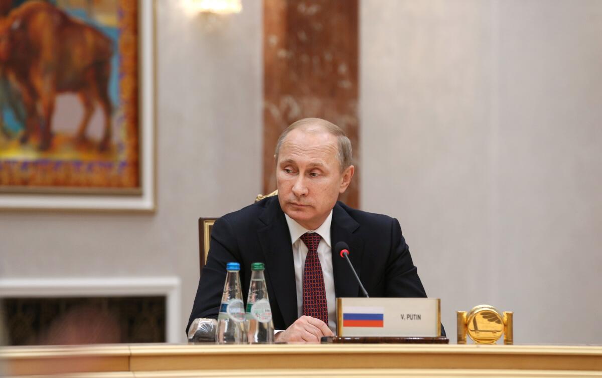 Vladimir Putin vince le elezioni in Russia con una percentuale di consensi senza precedenti - MINSK, BELARUS - Feb 11, 2015: Russian President Vladimir Putin before the negotiations leaders of states in Normandy format in Minsk