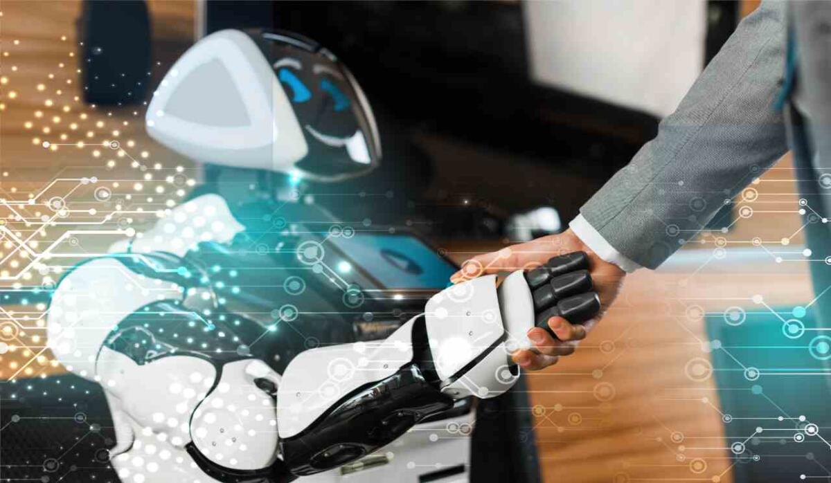 I 10 corsi gratuiti di Google per iniziare a lavorare con l'AI | E' il settore più quotato oggi - Robot che stringe la mano (Depositphotos) www.systemscue.it