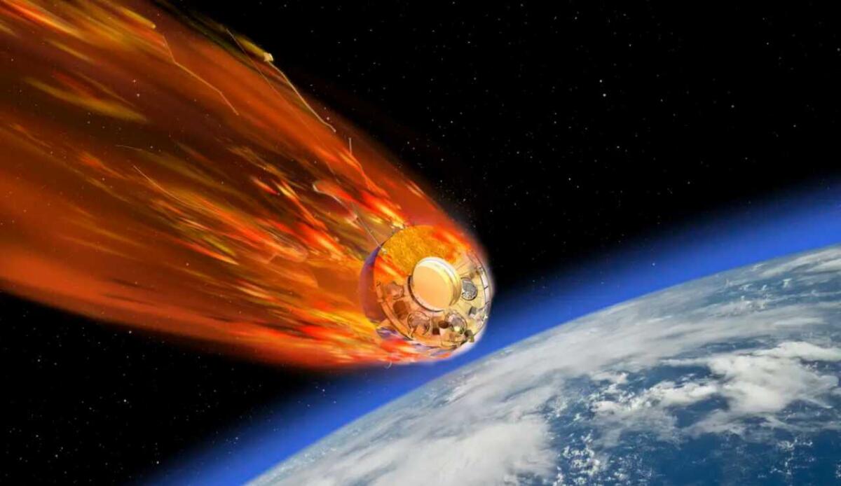 Lanceremo un satellite solo per vederlo rientrare e bruciare in atmosfera: la missione ESA - Rappresentazione di un satellite che rientra in atmosfera (David Ducross/ESA foto) - www.aerospacecue.it