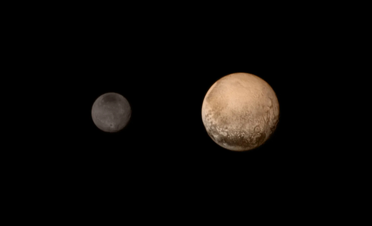 Plutone e Caronte (NASA Foto) - www.aerospacecue.it
