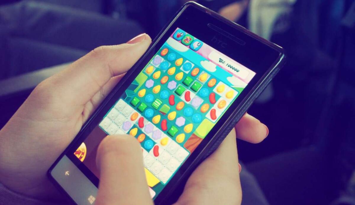 Licenziati per far spazio all’IA che avevano contribuito a creare: il caso Candy Crush - Illustrazione di Candy Crush (Canva FOTO) - managementcue.it