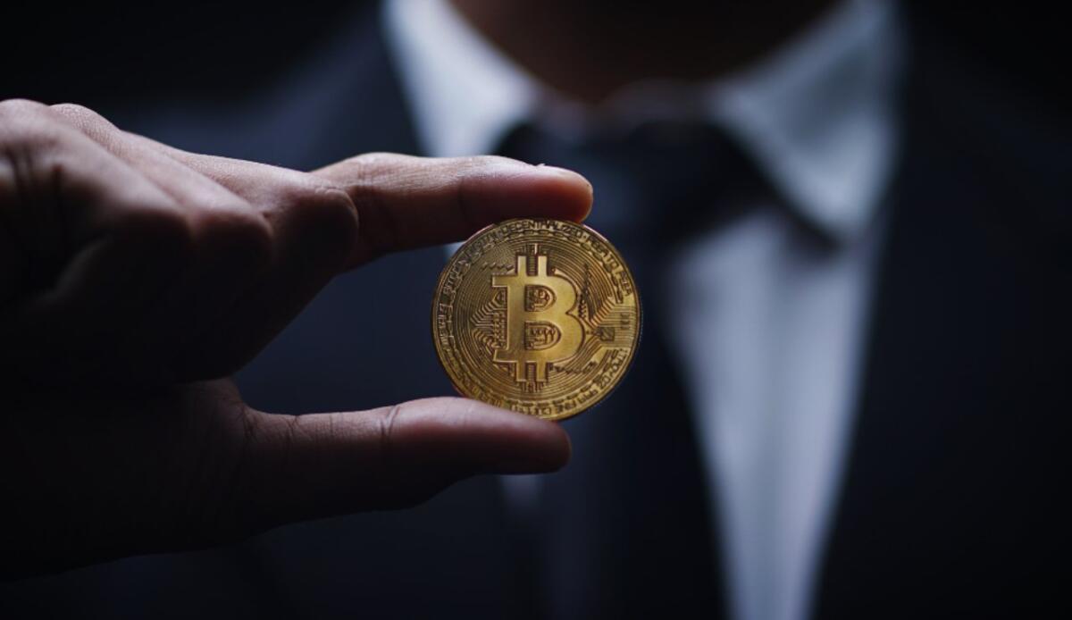 Chi ha creduto in Bitcoin dal 2011 oggi ha 120 milioni: ma il futuro resta un'incognita - Illustrazione di una "moneta" bitcoin (Canva FOTO) - financecue.it