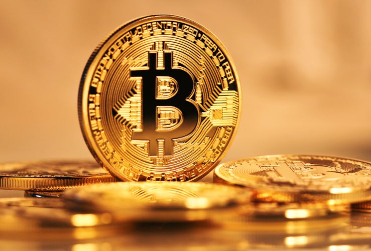Illustrazione di alcune monete virtuali (Canva FOTO) - financecue.it