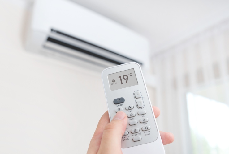 Illustrazione di un climatizzatore acceso (Canva FOTO) - buildingcue.it