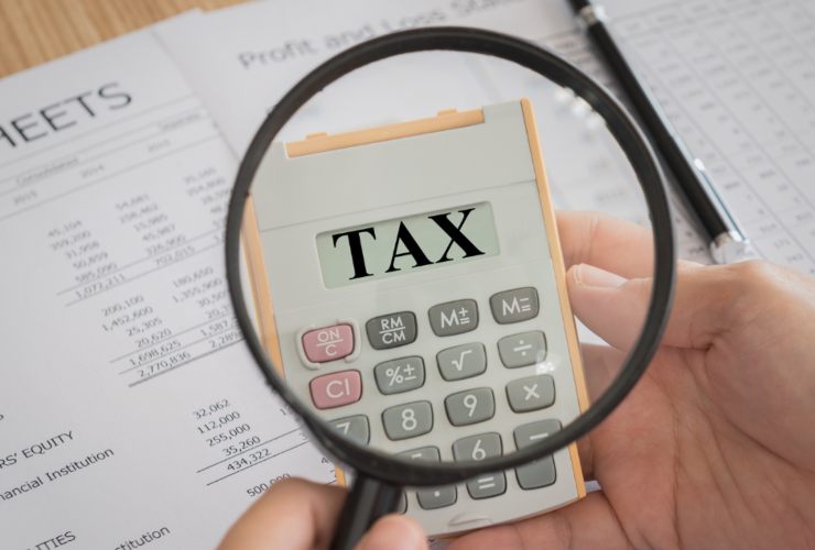 Illustrazione di una tassa (Canva FOTO) - financecue.it
