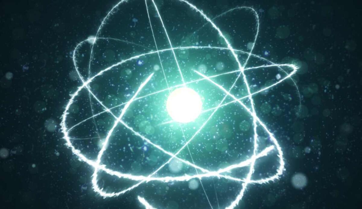 Ecco il nuovo orologio atomico più preciso al mondo: l’alluminio batte il cesio nella sfida del tempo - Illustrazione di un atomo (Canva FOTO) - sciencecue.it