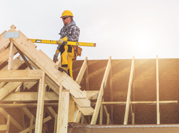 Illustrazione di una casa in legno (Canva FOTO) - buildingcue.it